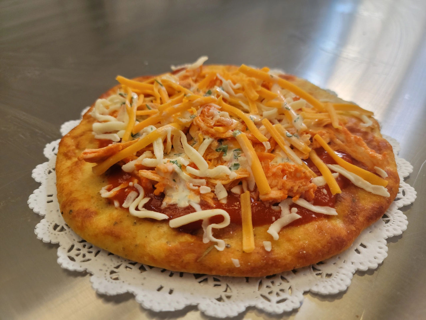Delicious keto-friendly Buffalo Chicken Pizza, low-carb and gluten-free