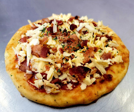 Artisan-crafted keto Bacon and Gouda Gourmet Pizza designed for a low-carb diet