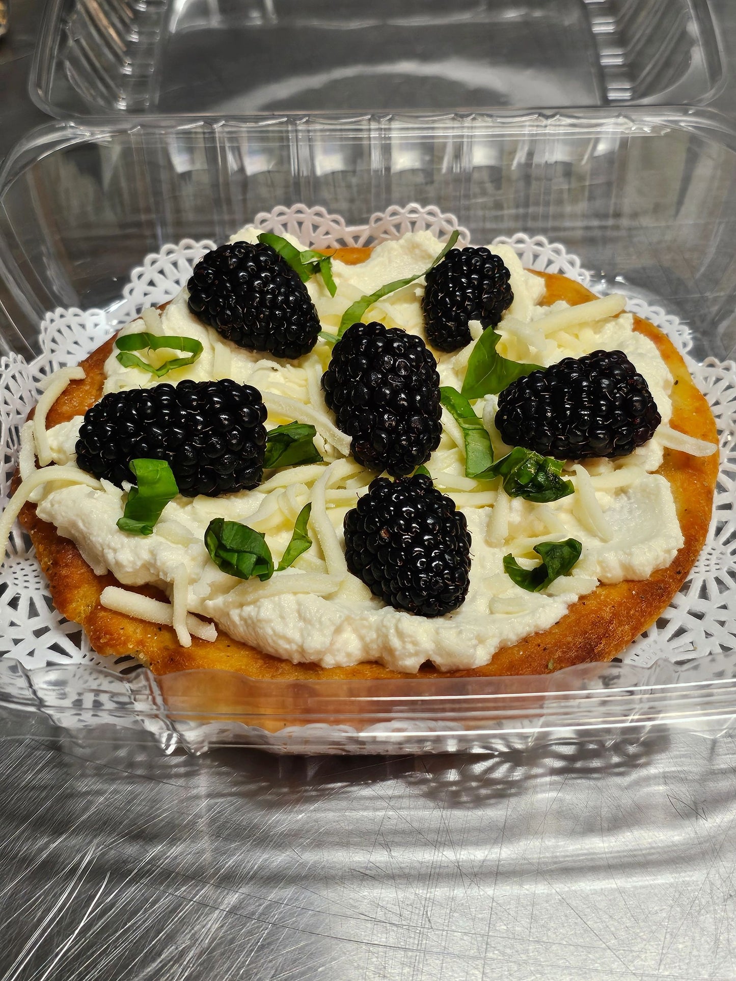 A delicious, low-carb NEW! Blackberry Basil Ricotta Pizza on a classic favorite dish