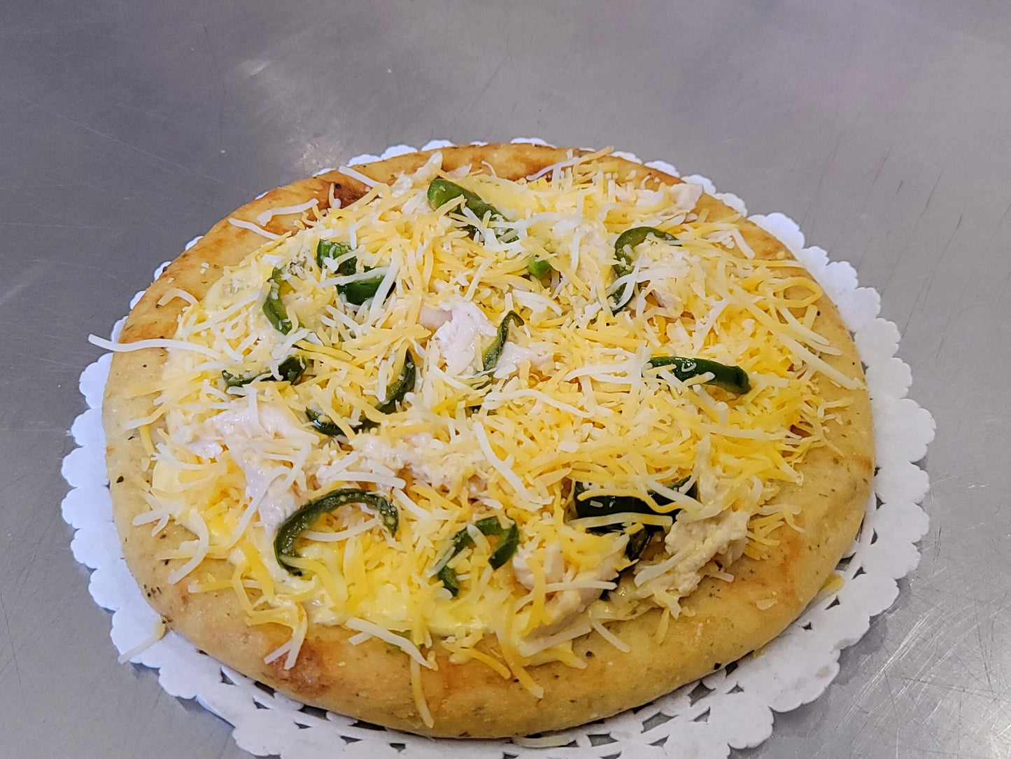 Low-carb, high-protein Cheesy Chicken Jalapeño Pizza perfect for a ketogenic diet
