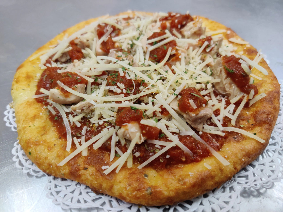 Freshly prepared keto-friendly Naked Chicken Parm Pizza for a balanced diet