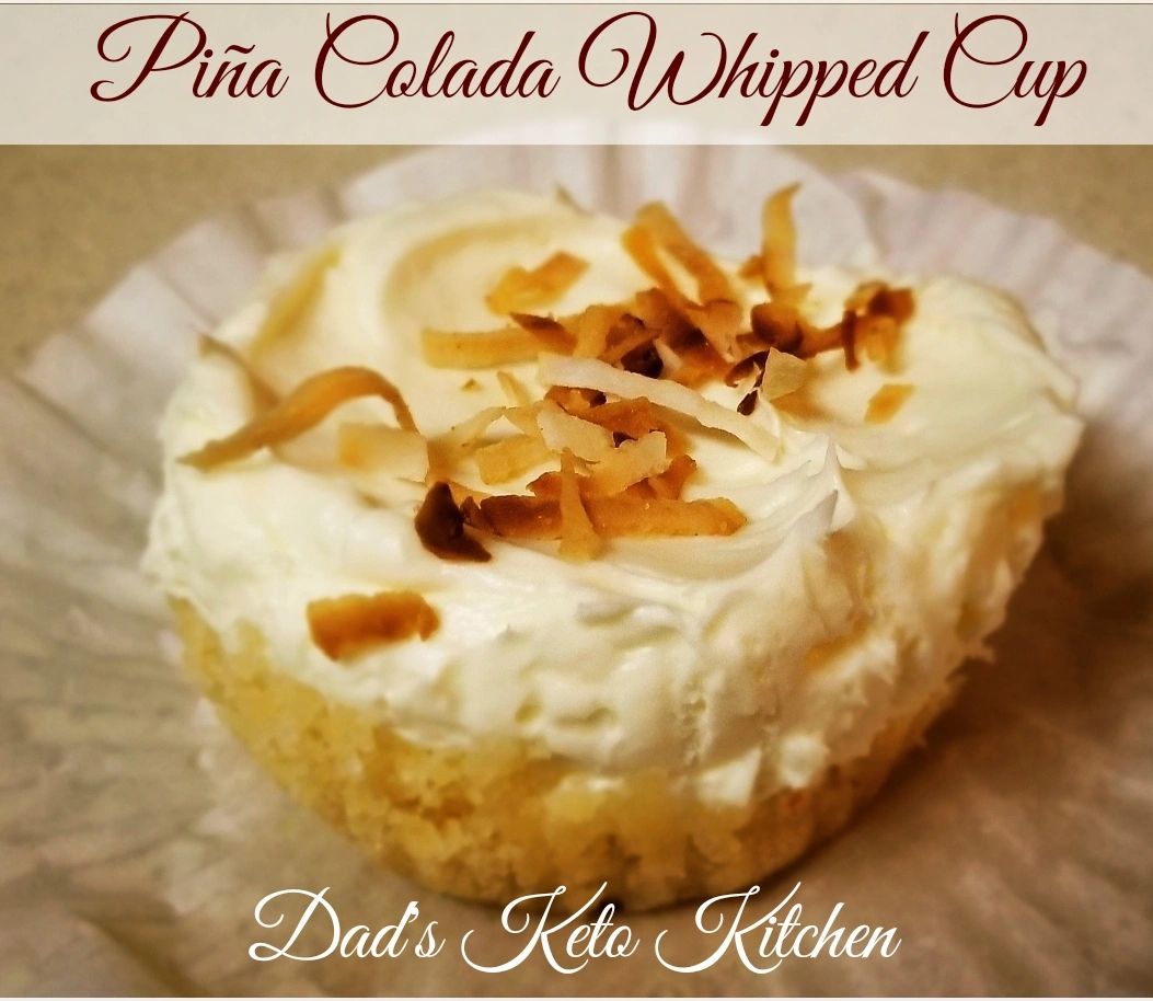 Healthy and tasty keto Piña Colada Whipped Cup w/ Toasted Coconut Topping for a guilt-free indulgence