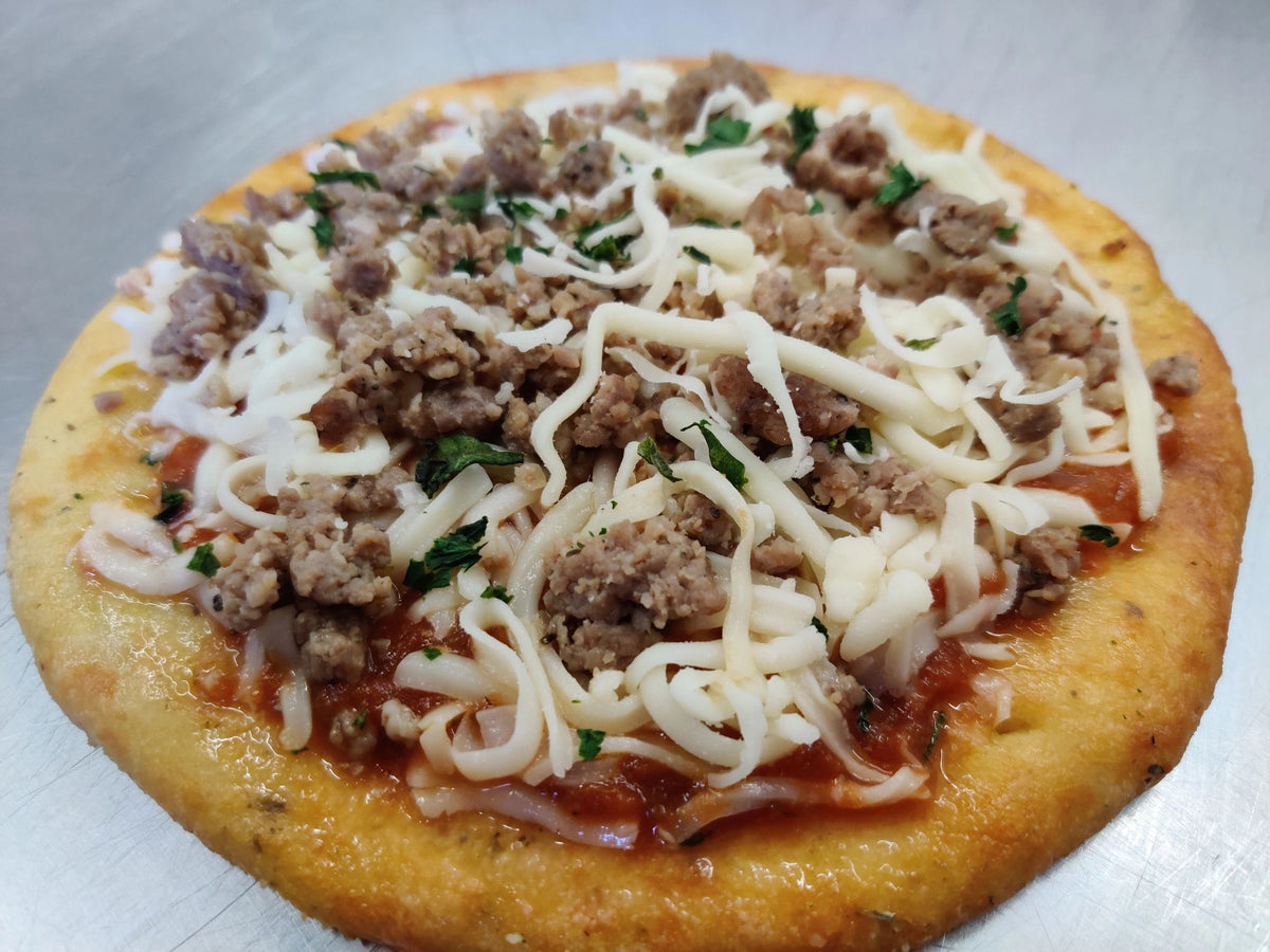 Hearty and nutritious keto-friendly Sausage Pizza with fresh ingredients