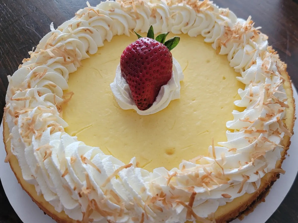 Tasty and nourishing low-carb Piña Colada Cheesecake (whole or slice) made for keto lovers