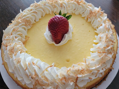 Tasty and nourishing low-carb Piña Colada Cheesecake (whole or slice) made for keto lovers