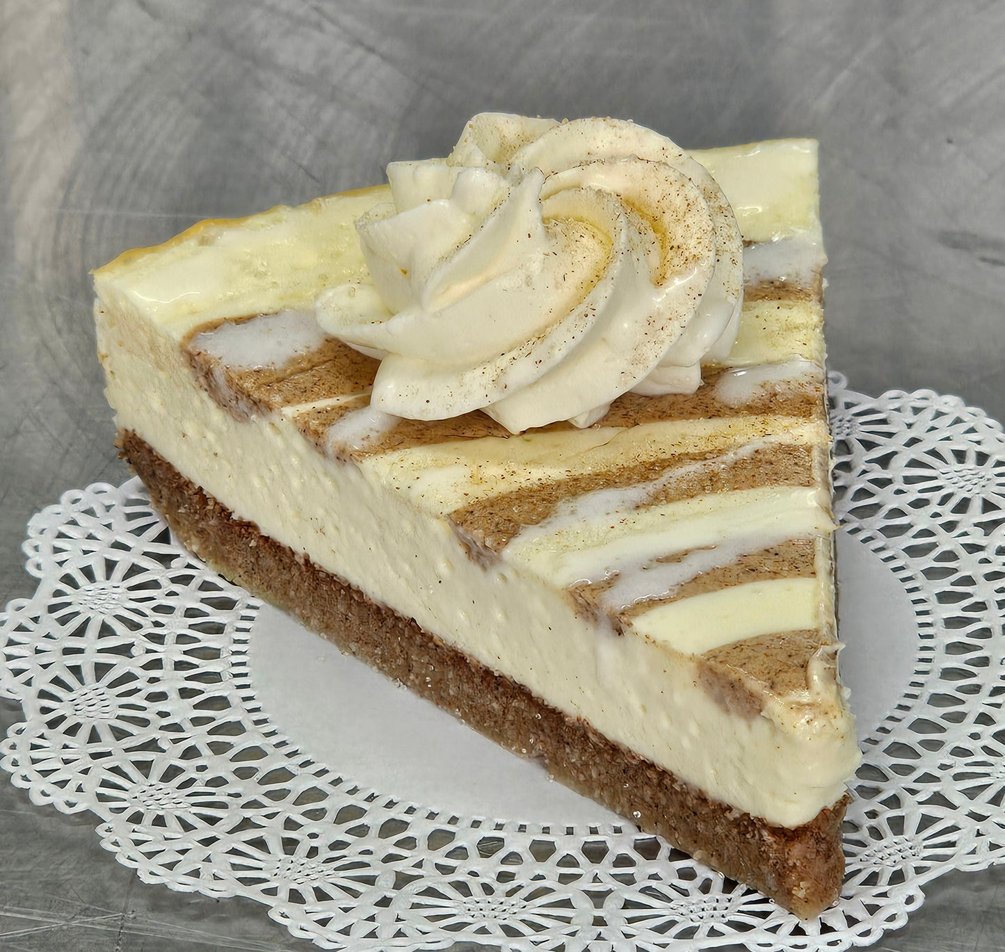 Cinnamon Roll Cheesecake (slice or whole)